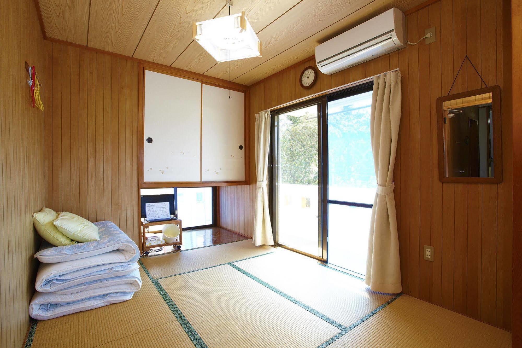 Hotel Minshuku Yadokari Zamami Exterior foto